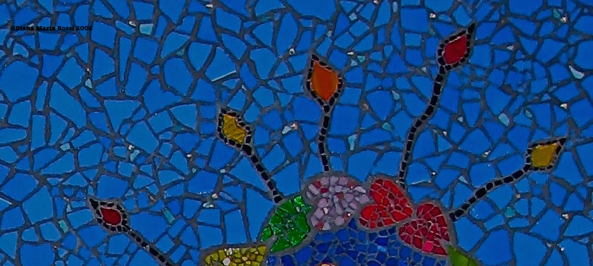 Picture of art glass mosaic Good Fortune in Berkeley on Addison Street detail flame like shapes on muted cobalt blue background